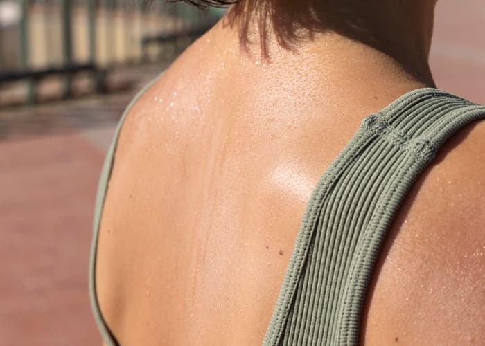 Back Acne Causes Why These Breakouts Keep Appearing